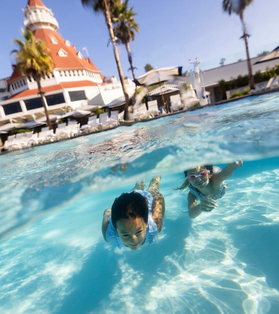 Kids swimming underwater