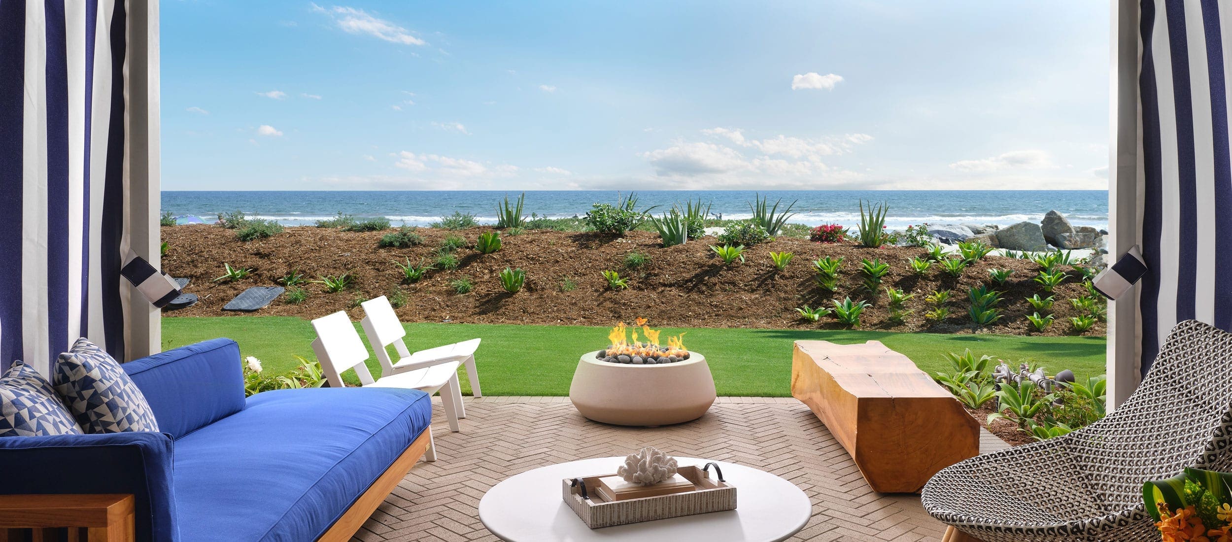 the views beachside terrace with fire pit