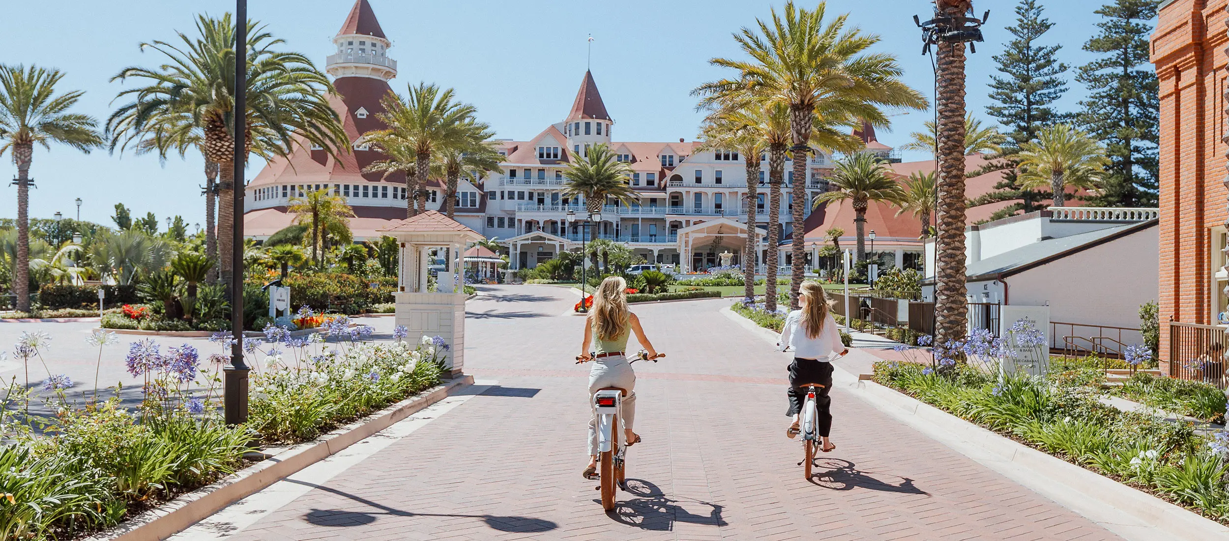 Women on bikes at The Del