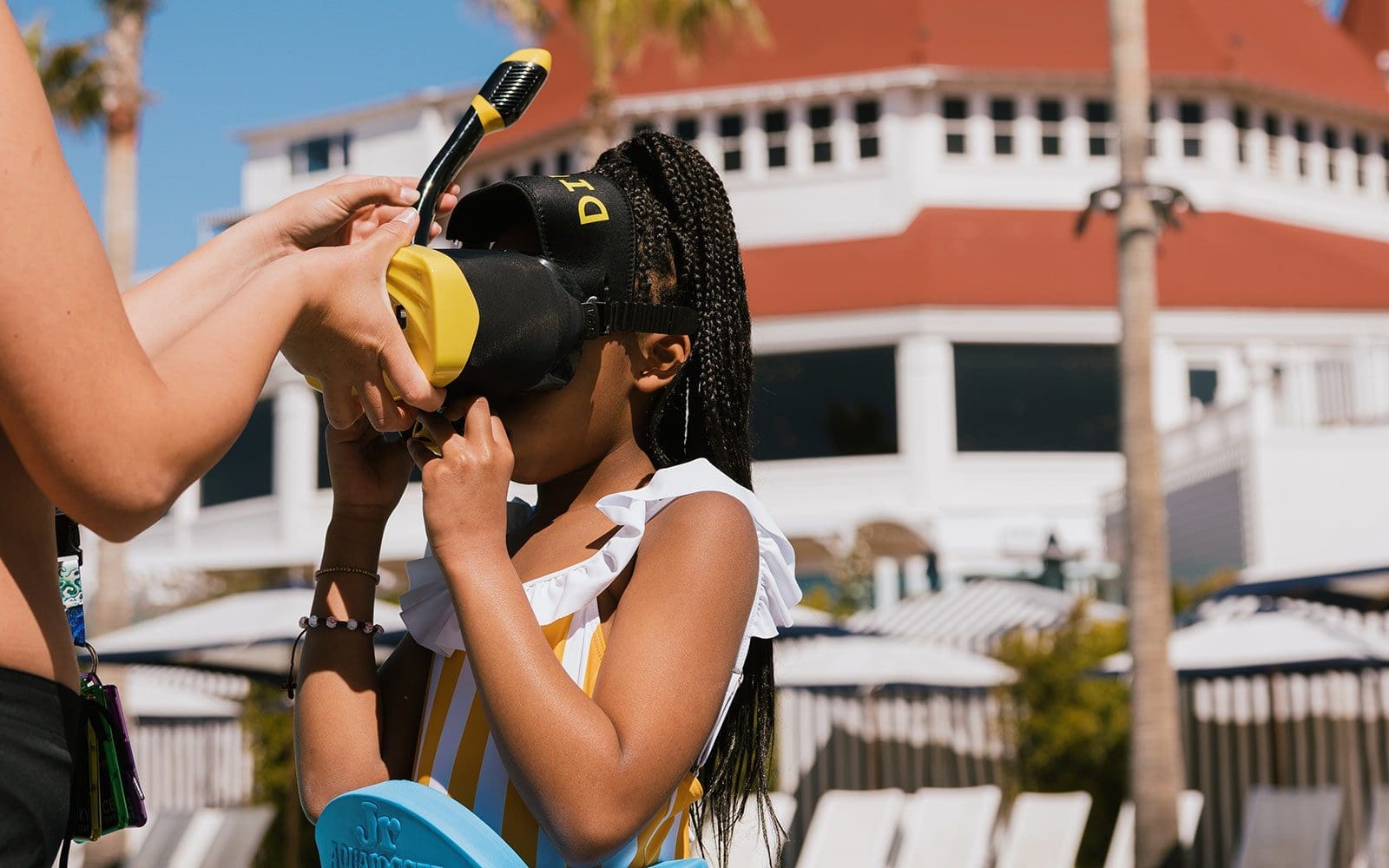 Girl wearing virtual reality snorkeling mask