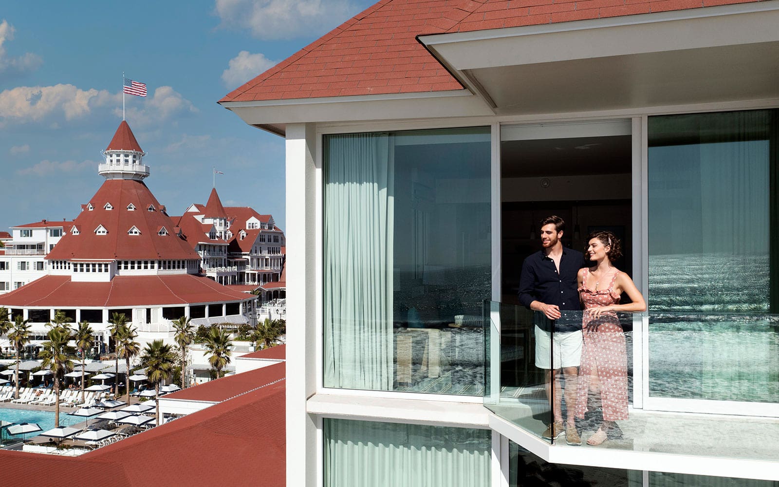Couple on The Views balcony with turret in background