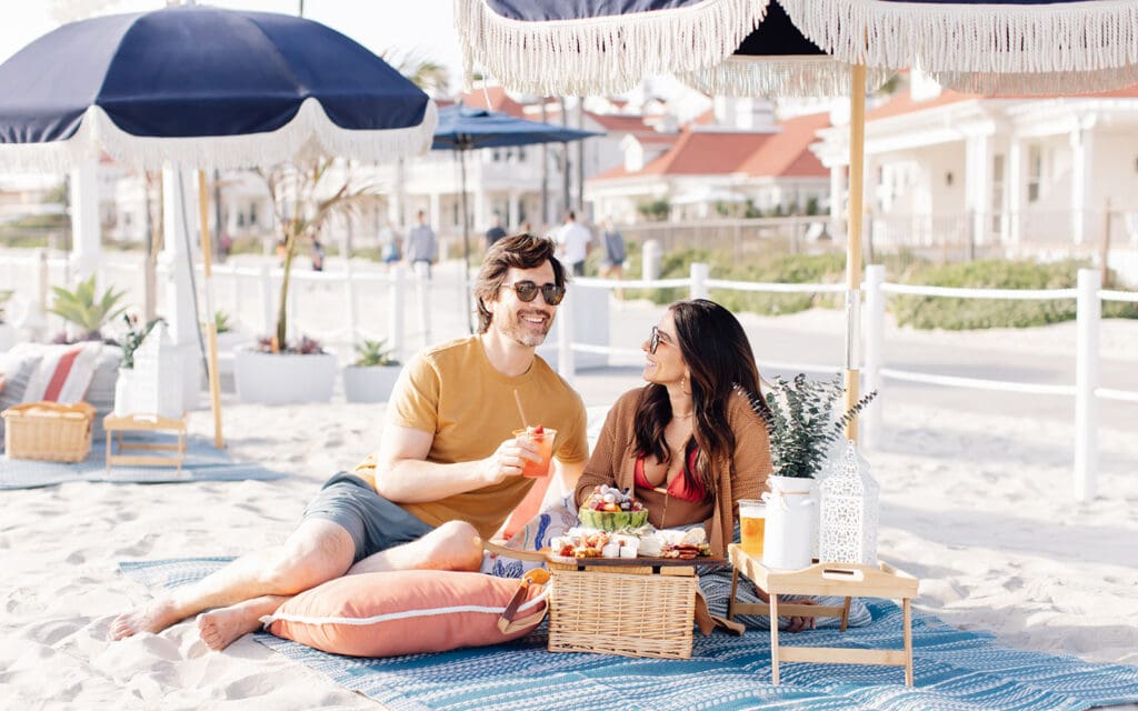 Couple picnicking at The Beach Club