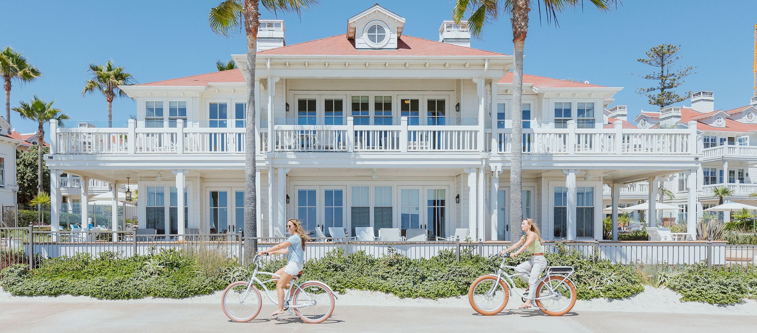 Couple biking along the beach