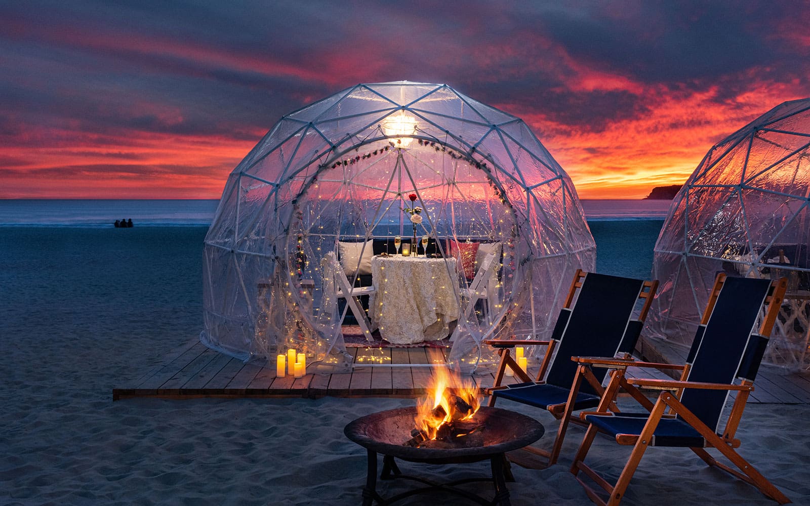 Igloo on the beach with dinner for two and fire pit