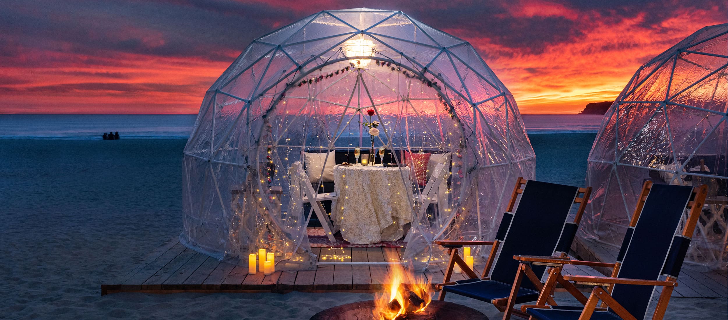 Igloo on the beach with dinner for two and fire pit