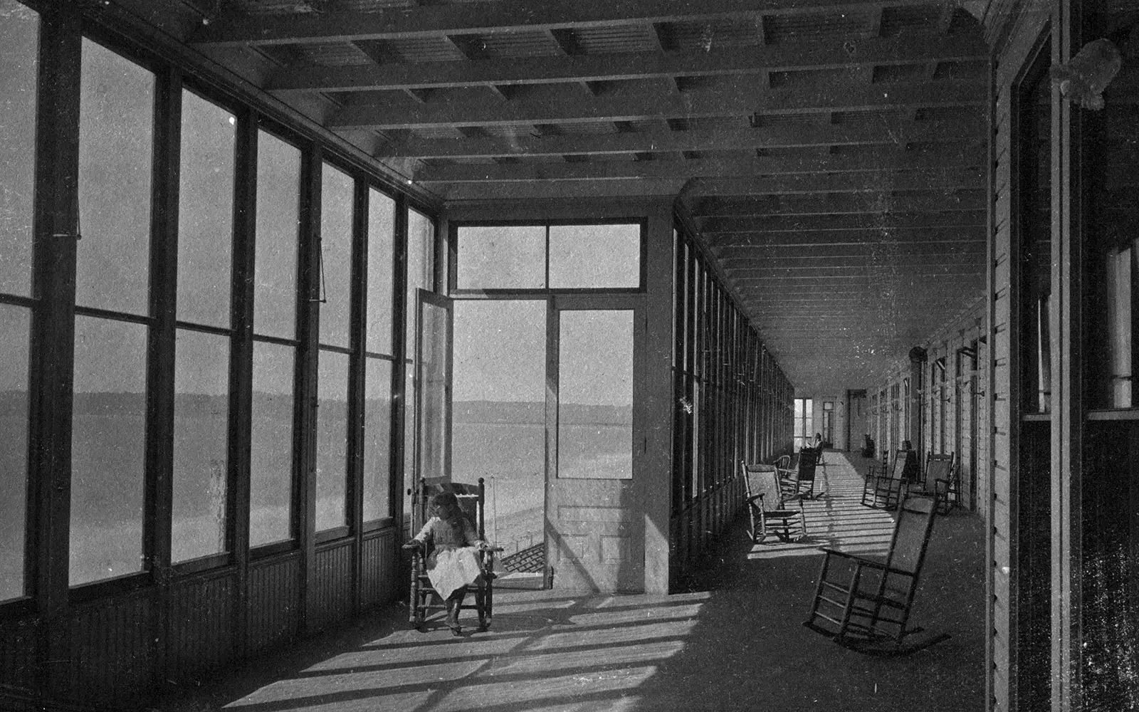 Historic veranda with little girl